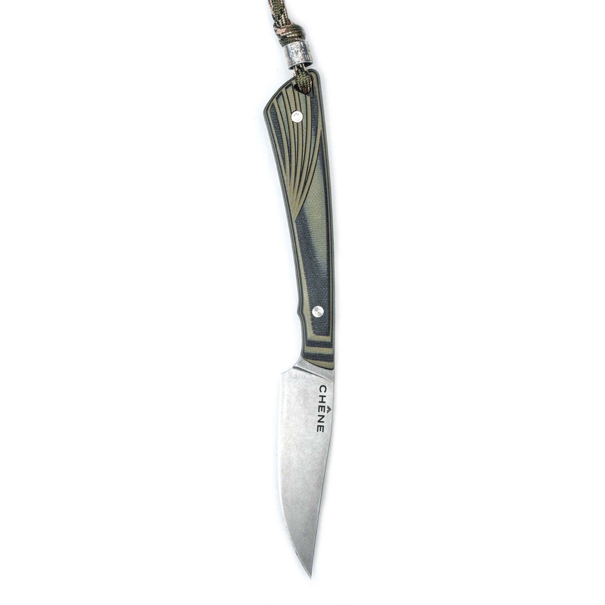 Chêne Freezout knife featuring a sleek design, green and black handle, and a sharp stainless steel blade.