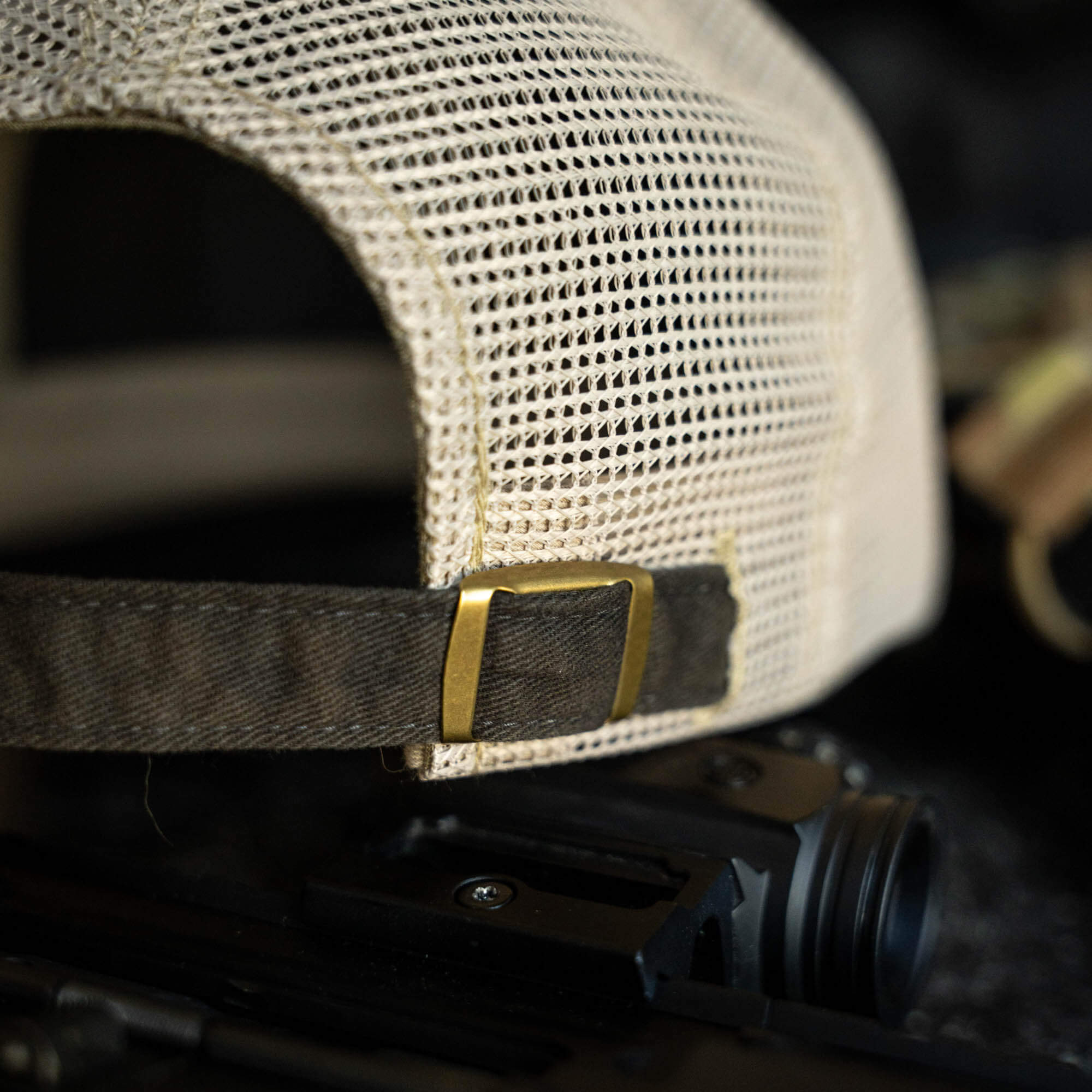 Close-up of the MKC Tactical Classic Trucker hat showcasing its mesh back and adjustable strap for a secure fit.