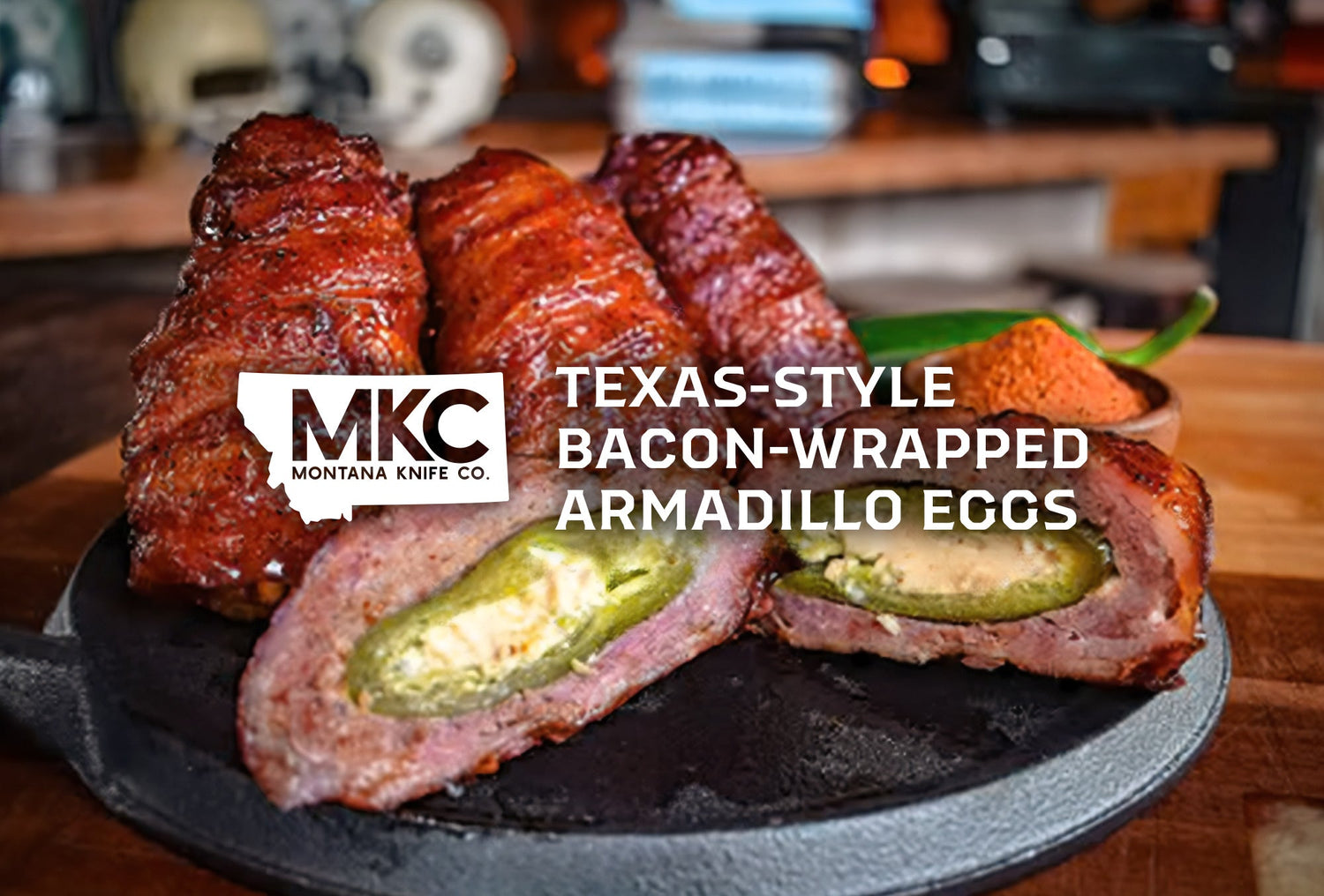 Texas-style bacon-wrapped armadillo eggs: jalapeños stuffed with cheese, wrapped in sausage and crispy bacon.