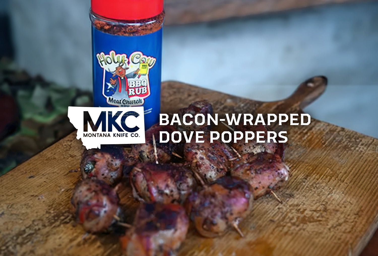 Bacon-wrapped dove poppers on a wooden board with Holy Cow BBQ Rub in the background.