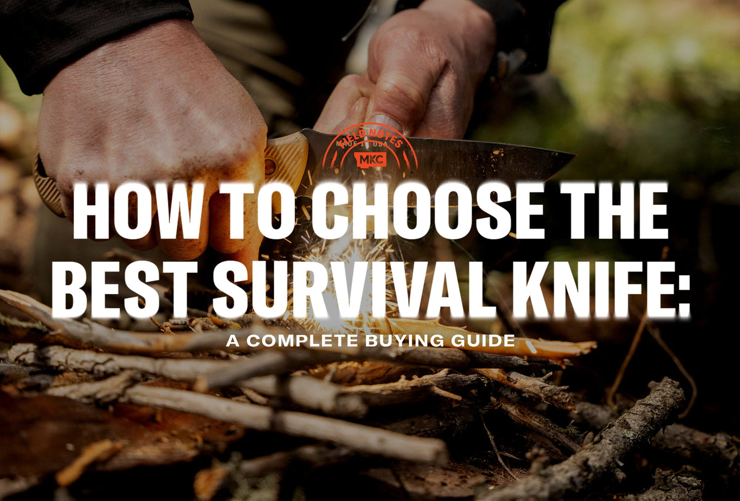 Two hands using an MKC survival knife to start a fire over small twigs, demonstrating practical outdoor use.