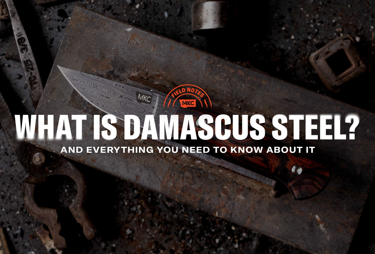 Close‑up of a Damascus steel knife showing its distinctive wavy, patterned blade.