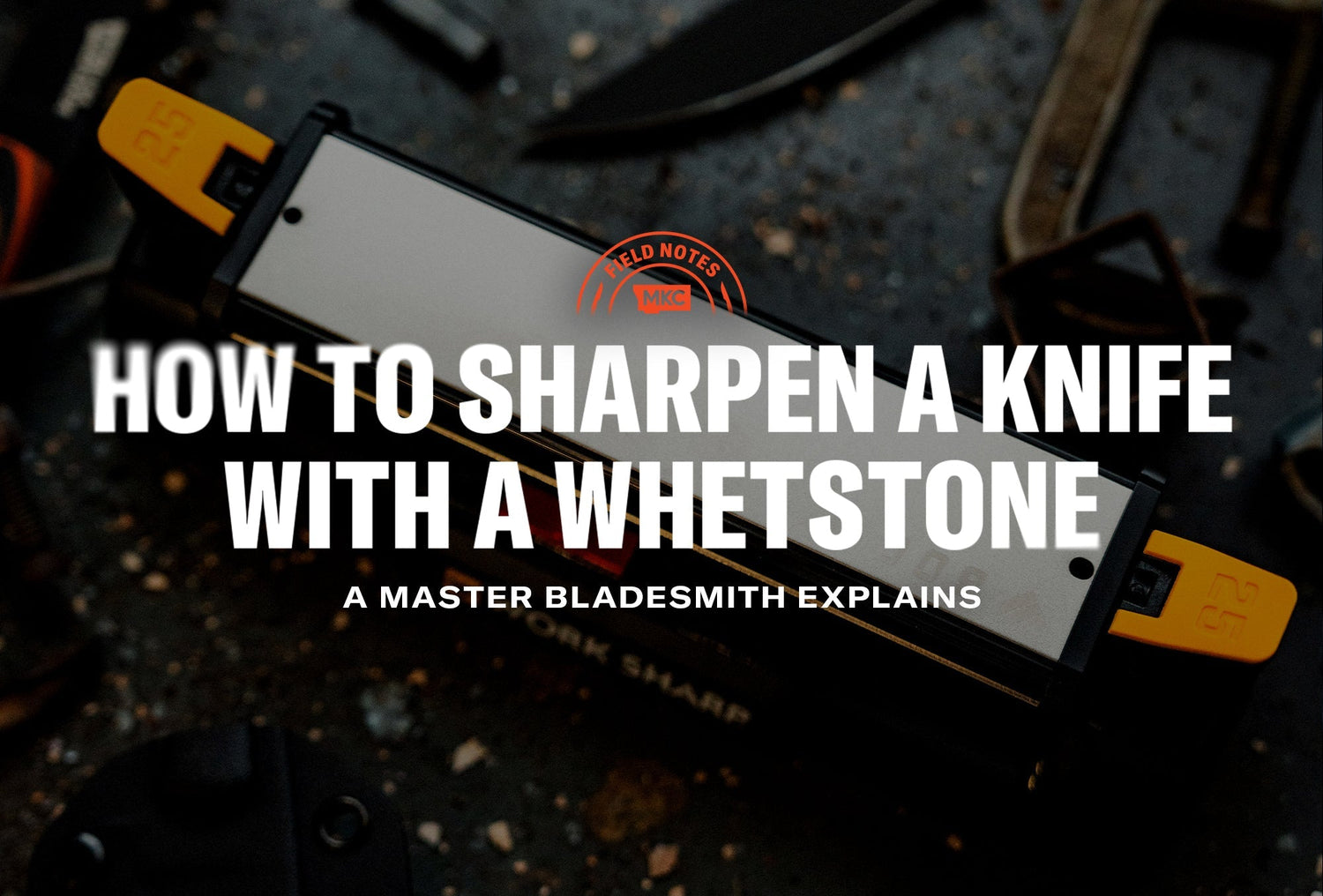 Close‑up of an MKC whetstone on a dark surface illustrating how to sharpen a knife with a whetstone.