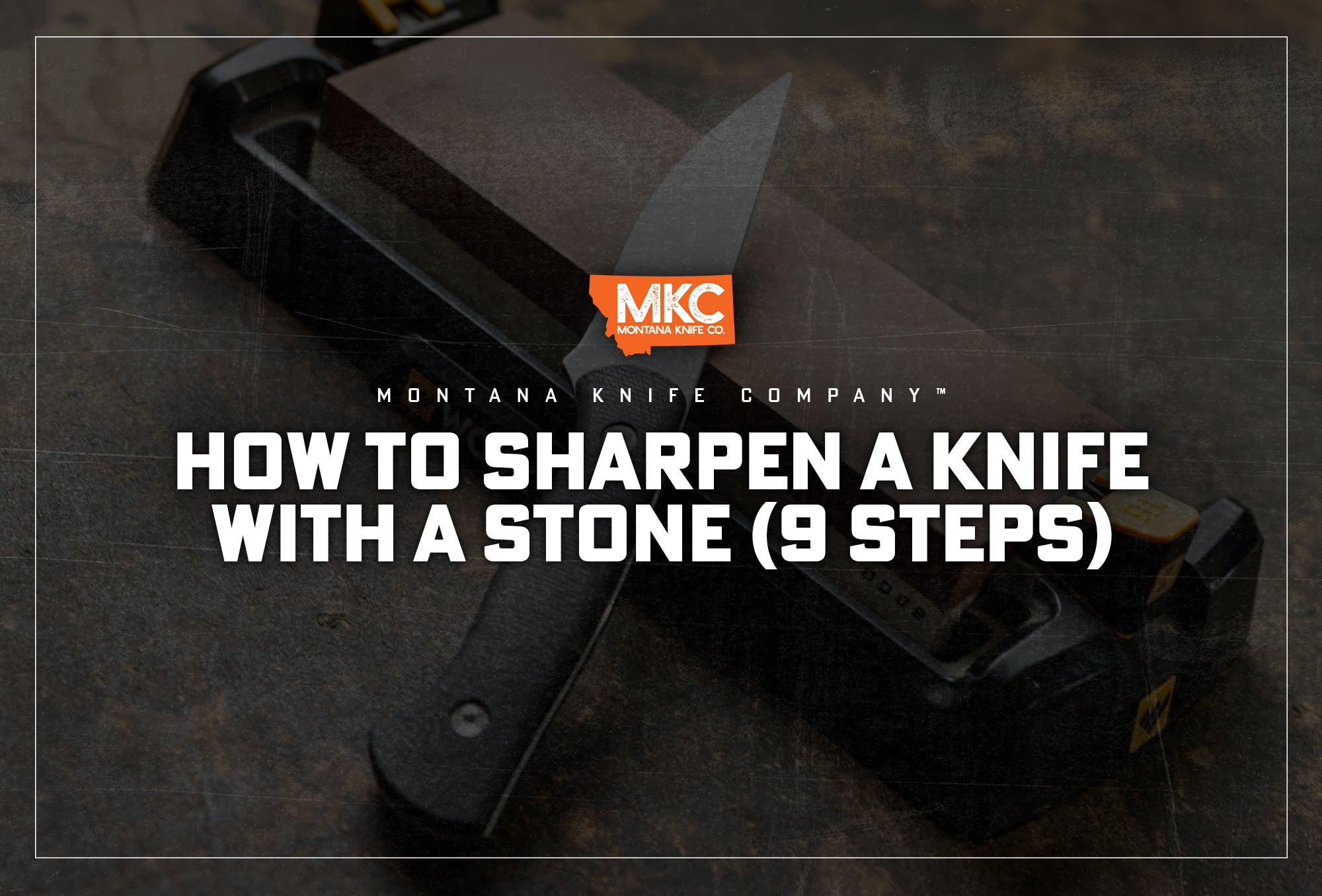 An MKC knife leans up against a knife-sharpening stone.