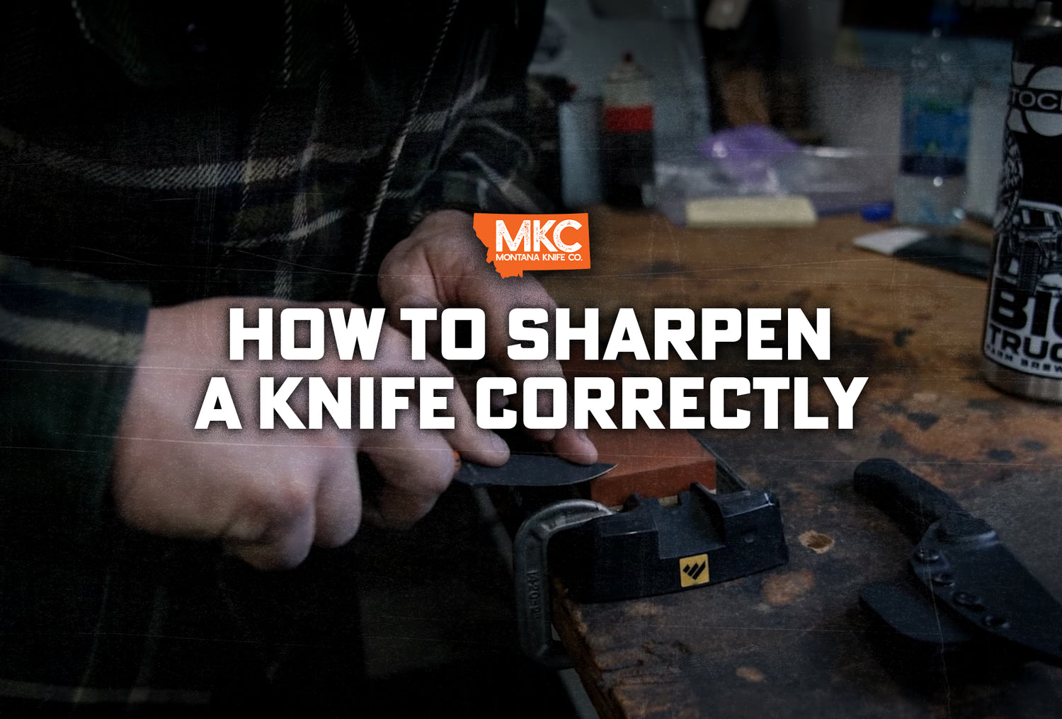Josh Smith uses a whetstone to demonstrate how to sharpen a knife correctly.