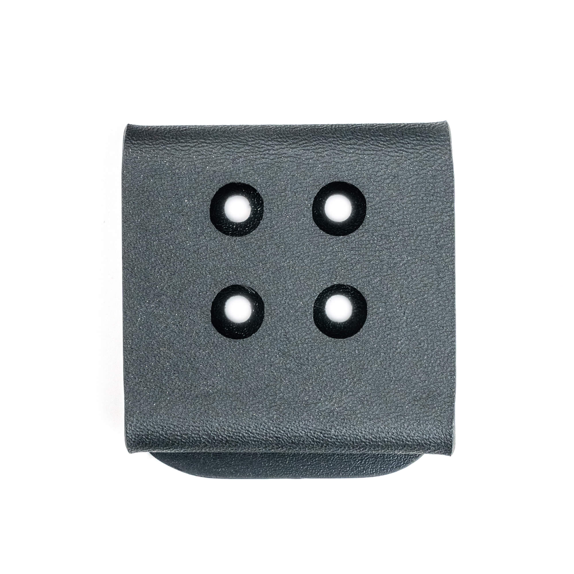 Alt text: Close-up image of a black Kydex belt clip with four holes for attachment, displayed on a white background.