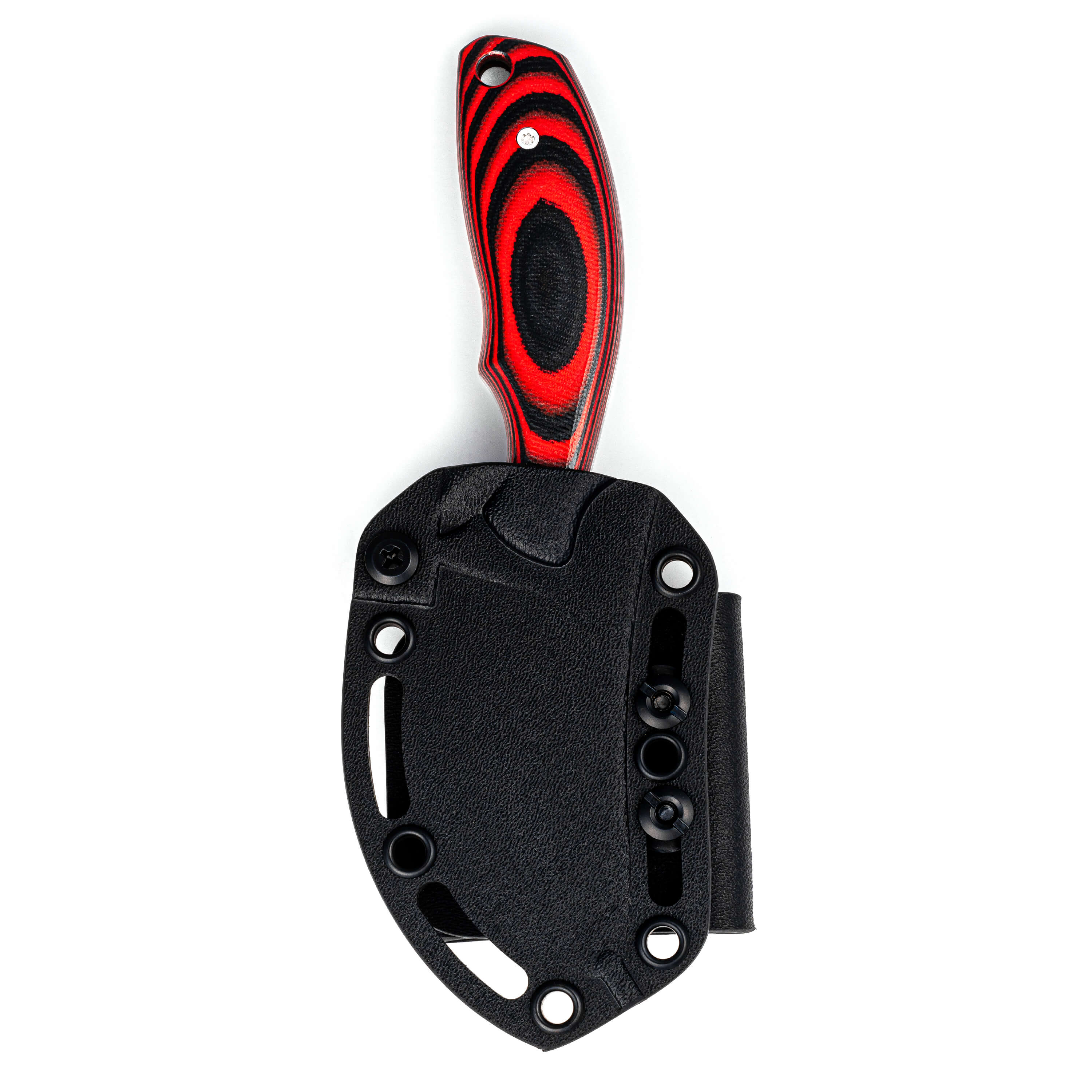 Red and black handled skinner knife with a textured grip, displayed with a black sheath with multiple attachment points, isolated on a white background.