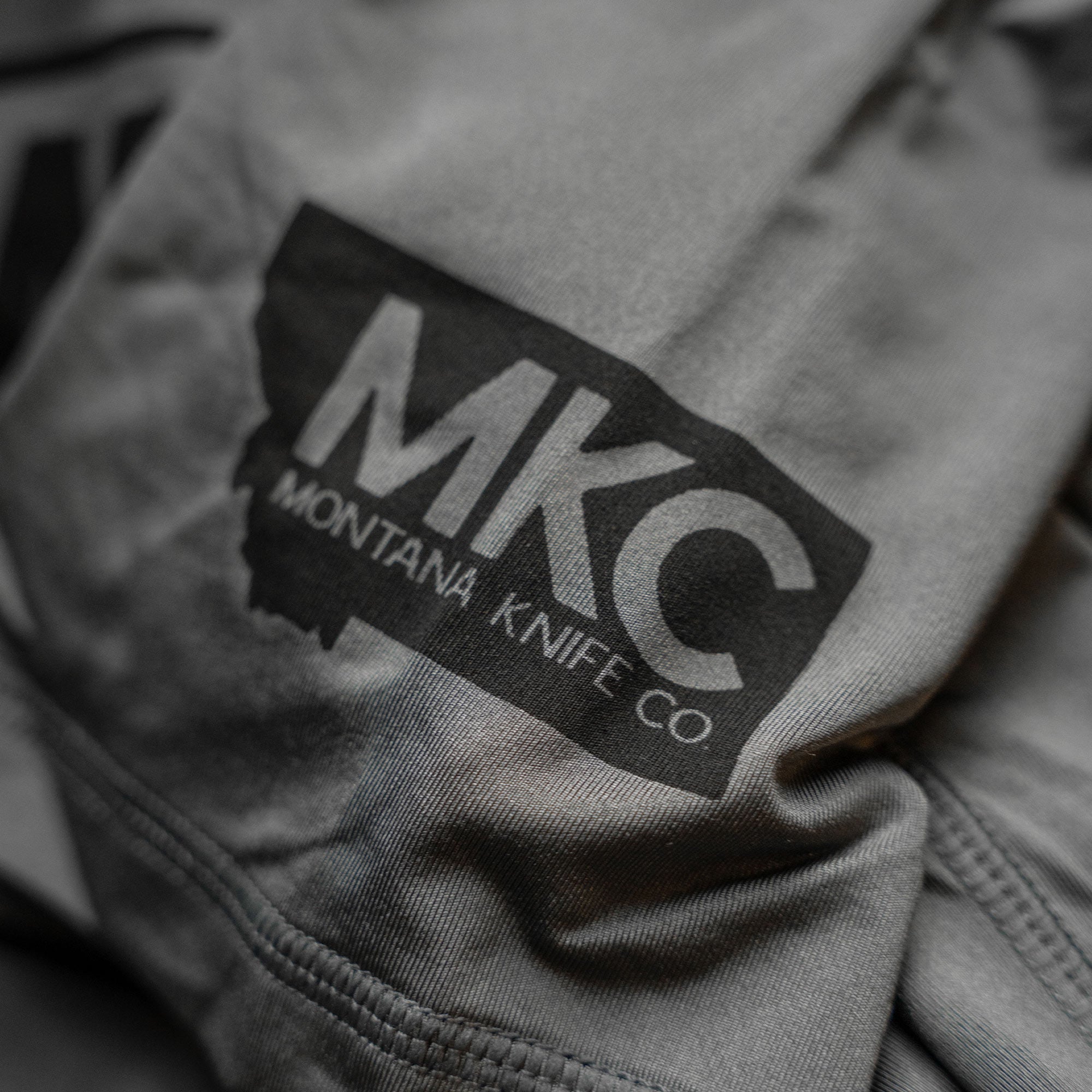 MKC PERFORMANCE TEE - GREY