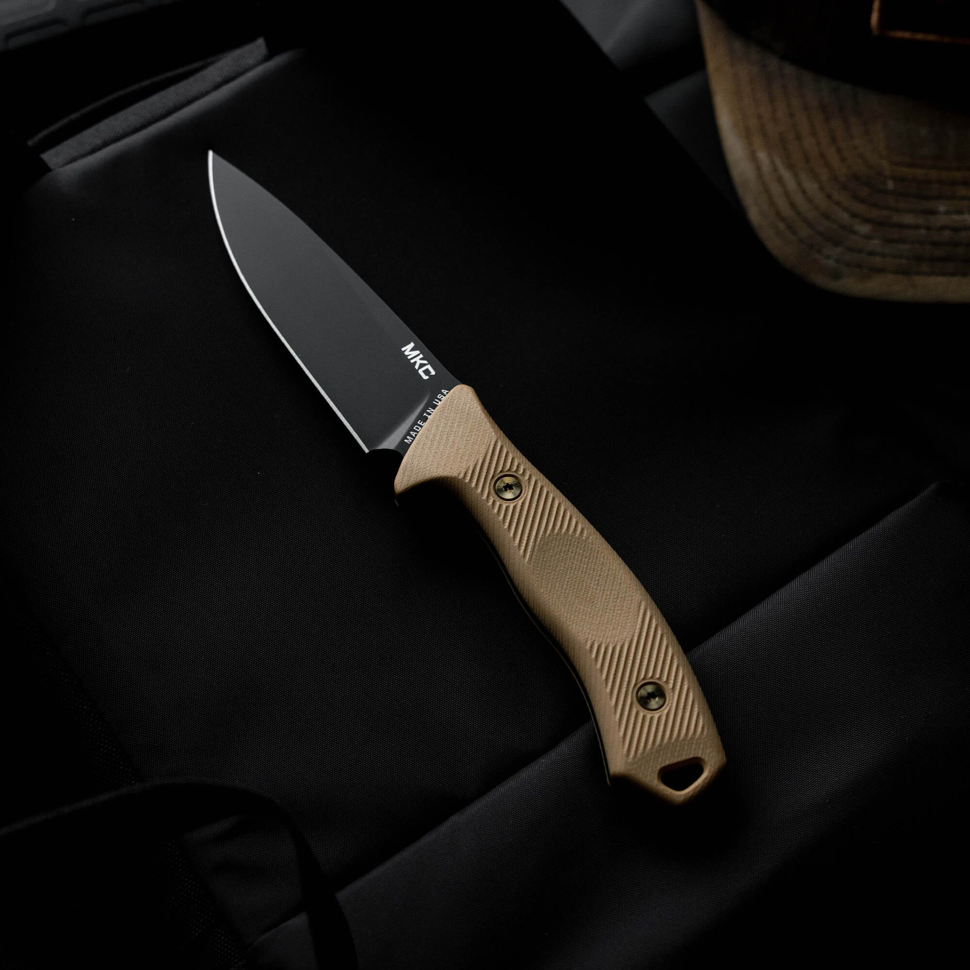 Montana Knife Company's TF24 knife features a durable blade and ergonomic handle, ideal for outdoor and tactical use.